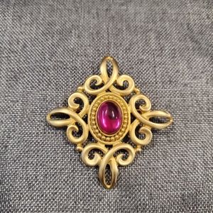 Goldtone Brooch with Magenta Cabachon